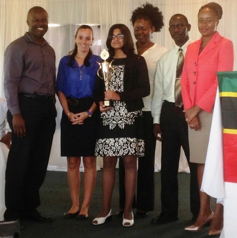 (L-R) Chief Executive Officer of the Nevis Tourism Authority Greg Phillip, Principal of the Nevis International Secondary School Joy Napier, 2015 Youth Congress winner Tarana Kacker, Teacher/Chaperon Latoya Blair, Policy and Regulations Officer, Ministry of Tourism John Hanley and Chief Operating Officer at the Bank of Nevis Ltd. Lisa Herbert